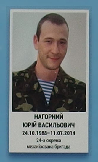Portrait on the memorial 'Wall of Remembrance of the Fallen for Ukraine' in Kyiv: section 1, row 3, position 37.