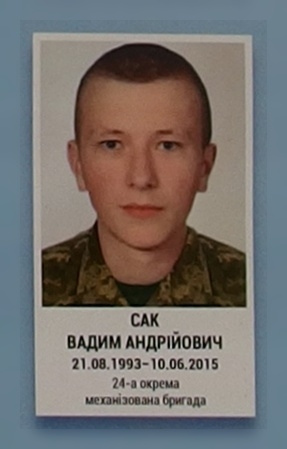 Портрет на меморіалі 'Стіна пам'яті полеглих за Україну' у Києві: секція 7, ряд 9, місце 11.